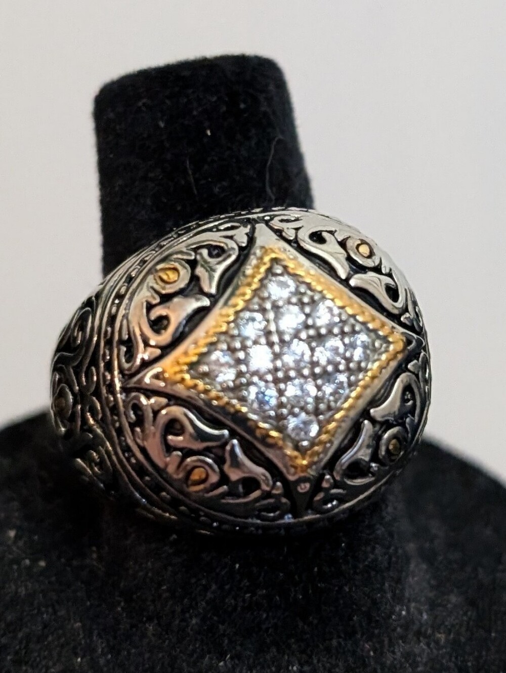 #97. Ornate Silver-Tone Ring with Gold Accents and Pavé Stones